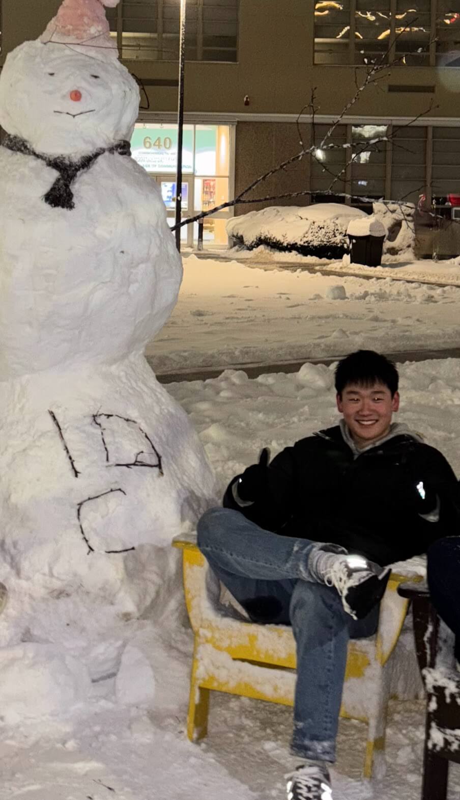 junsa smiling with snowman 