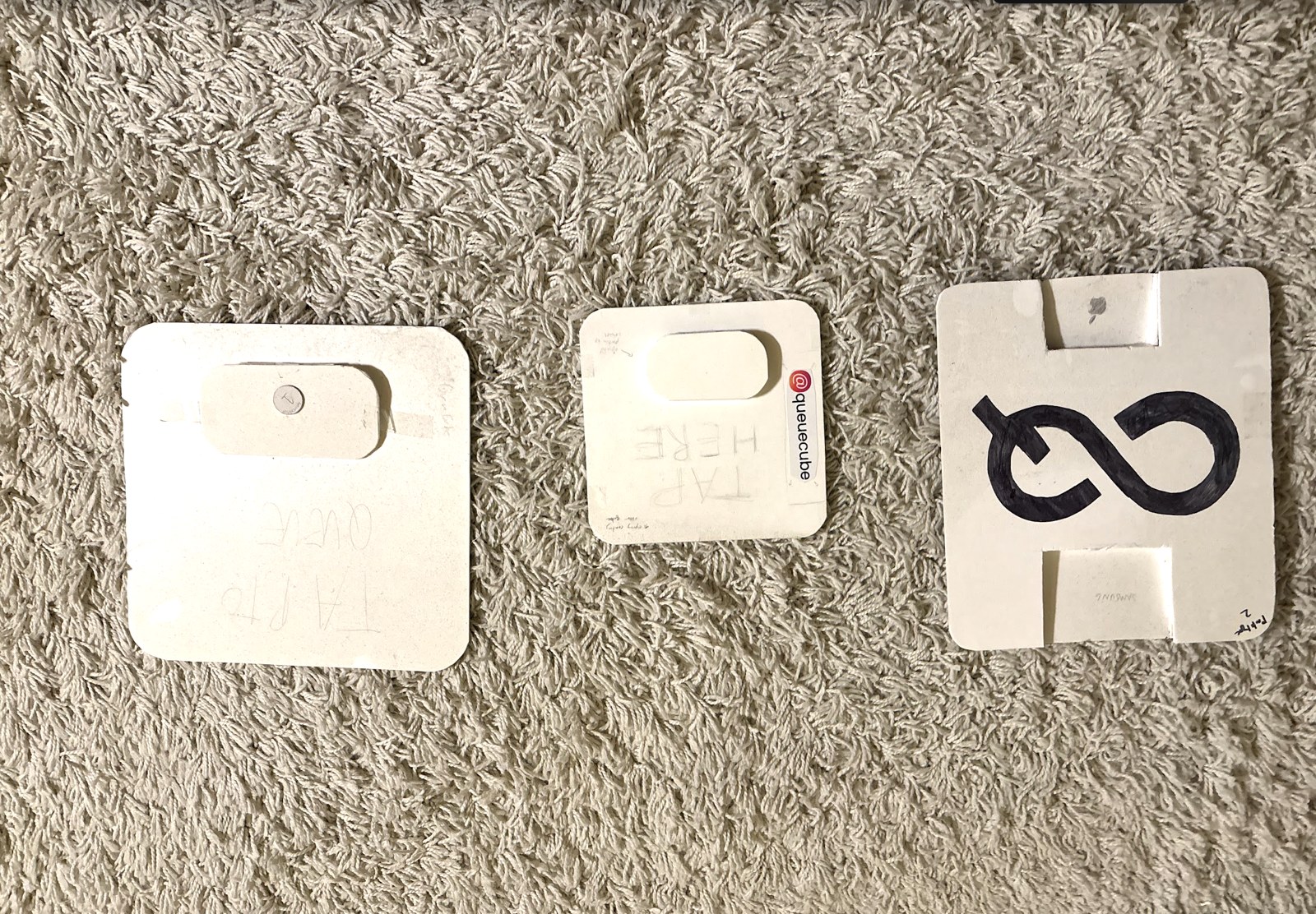 QueueCube prototypes cut from PVC sheet